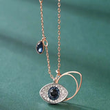 Evil Eye Necklace with Blue Crystal and Key Design
