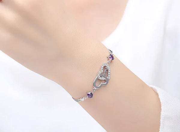 Pulsera de plata 925 con doble corazón de cristal y circonitas
