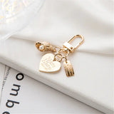 Elegant Peach Heart Shell Pendant Key Chain with Pearl